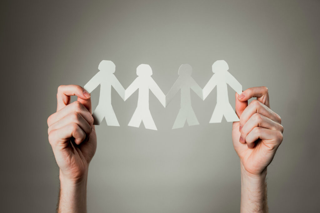 paper cut outs of people